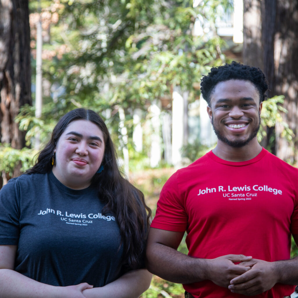 Two students wearing John R Lewis college t-shirts.