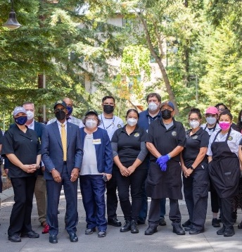 President Michael V. Drake with Dining Hall Workers 