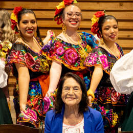 Dolores Huerta with UCSC students from Grupo Folklórico Los Mejicas at the 30th anniversary and naming celebration. Photo: Devi Pride Photography