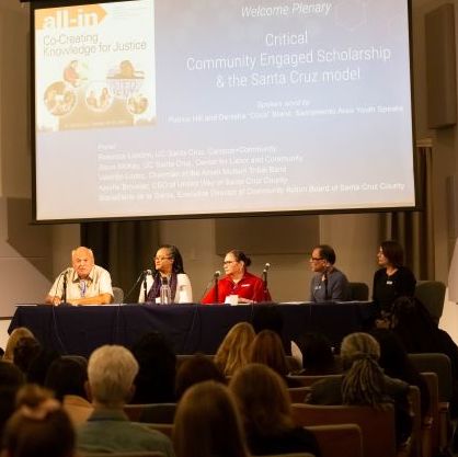Image of a discussion panel on community engagement. 